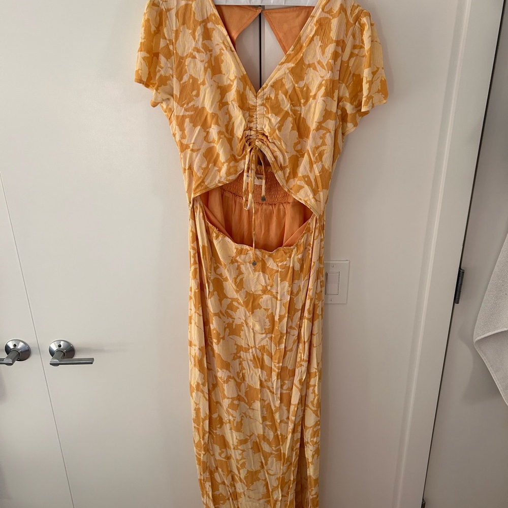 The Normal Brand Yellow Maxi Dress with cut out